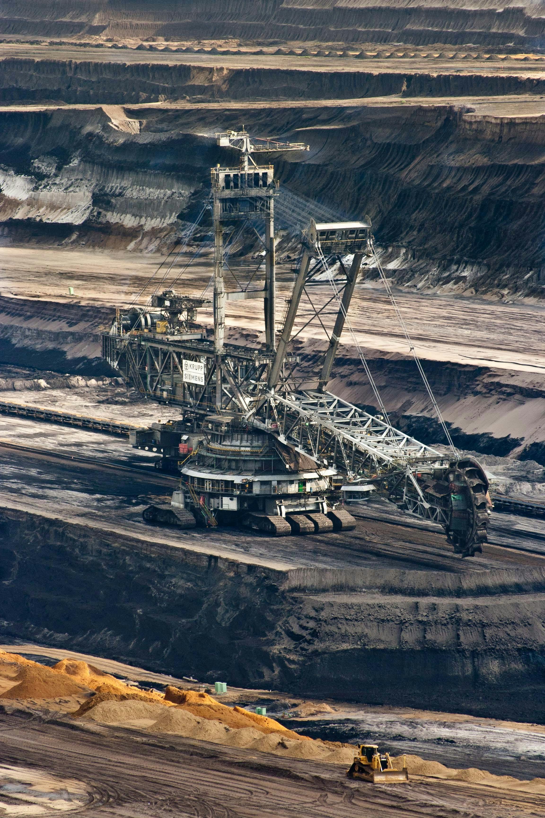 Mining operations showing heavy machinery at work in an industrial setting